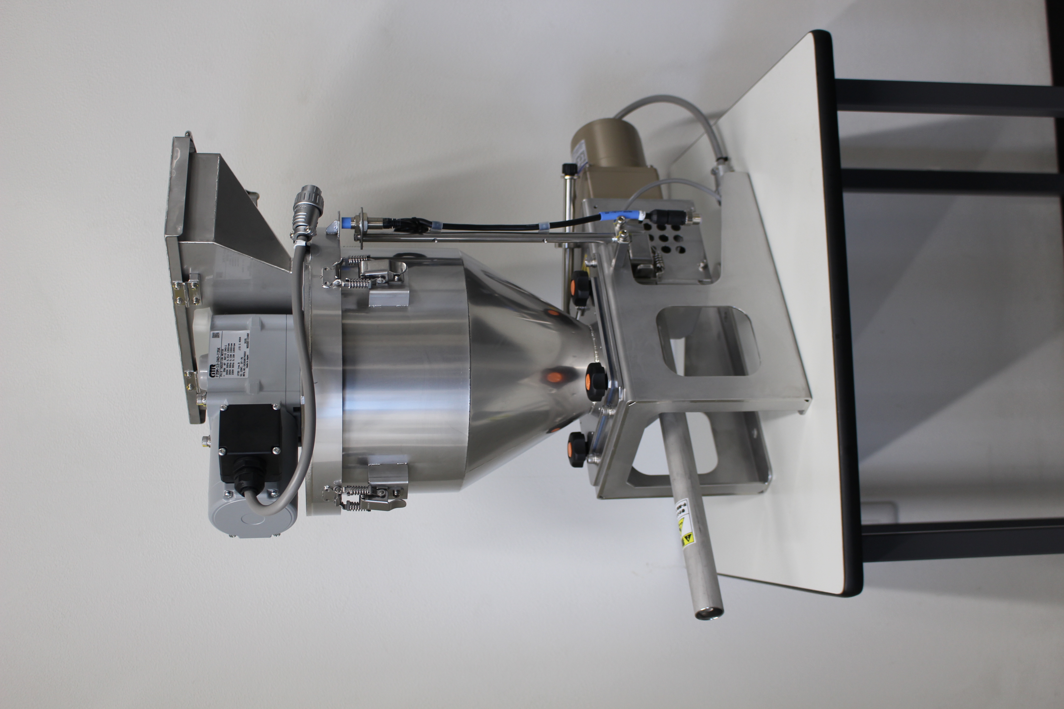 Seiwa Giken Compact Screw Feeder for limited factory space